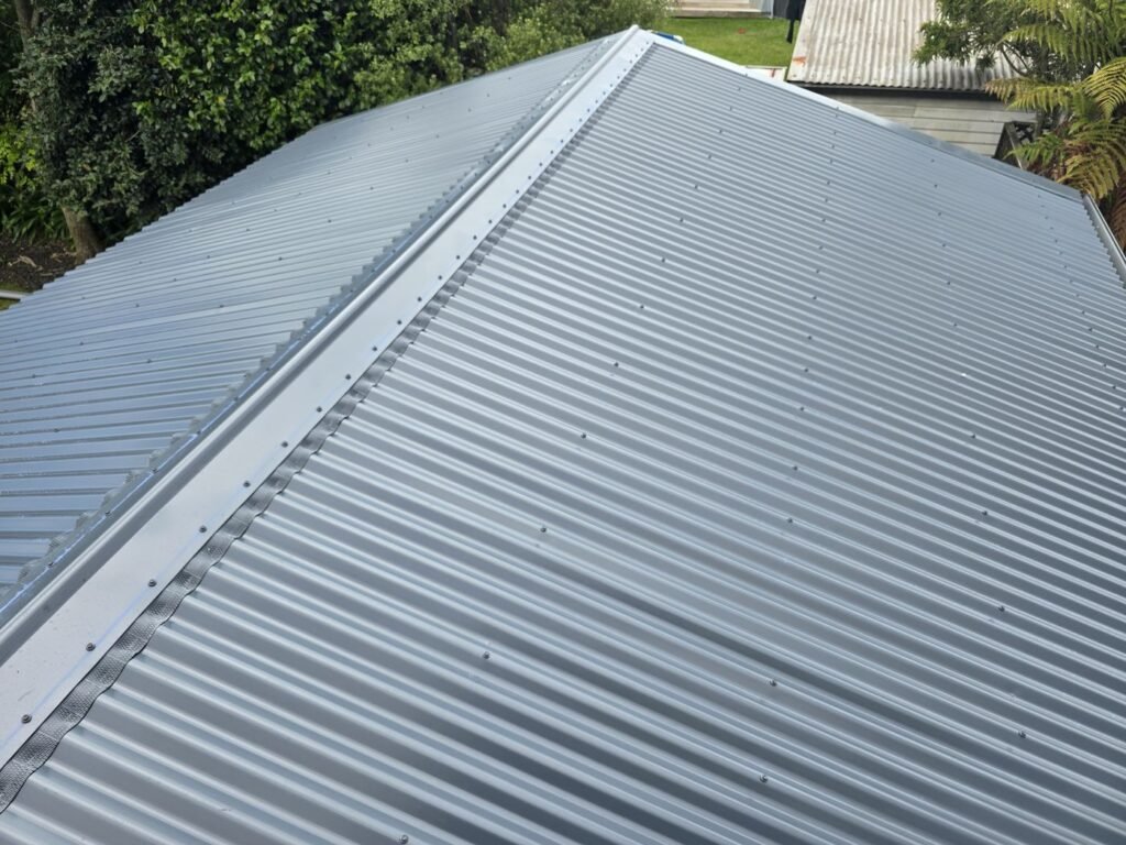 New long run iron on the garage roof after replacement