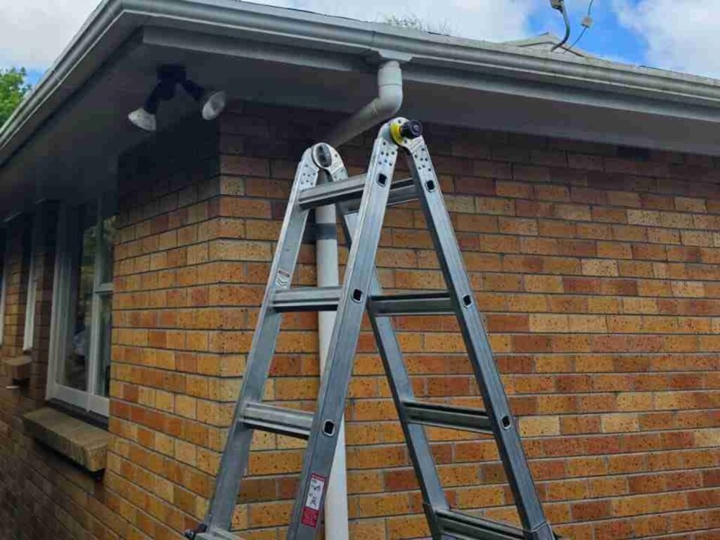 Spouting corner and downpipe outlet after repair